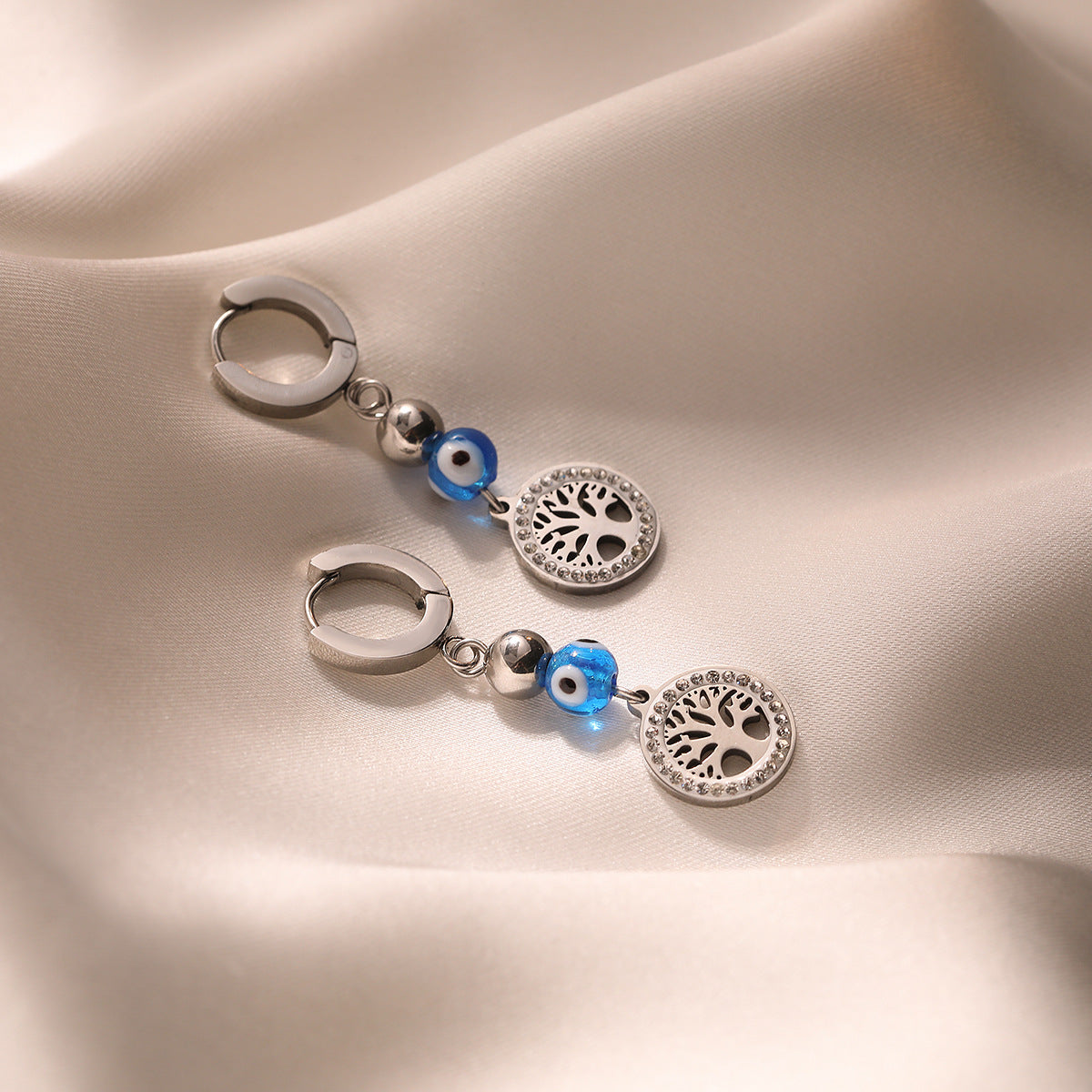 Orecchini da donna minimalisti geometrici in acciaio al titanio placcato oro con zirconi a forma di albero