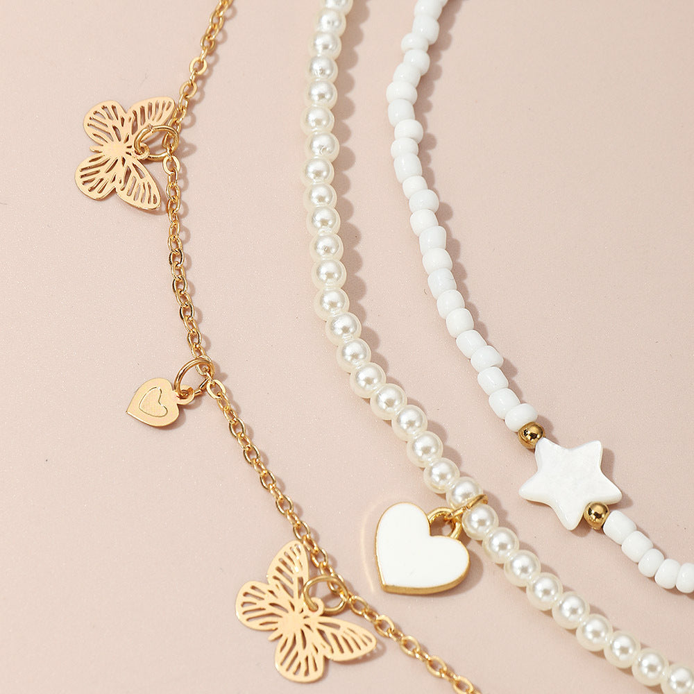 Set di collane con ciondoli a forma di cuore, farfalla e stella, da bambina, con ciondolo in lega e catena di perle in stile principessa
