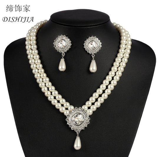 Conjunto minimalista de collar y pendientes de perlas y cristales de doble capa con dijes de corazón, gota de agua y campana en cadena O para mujer