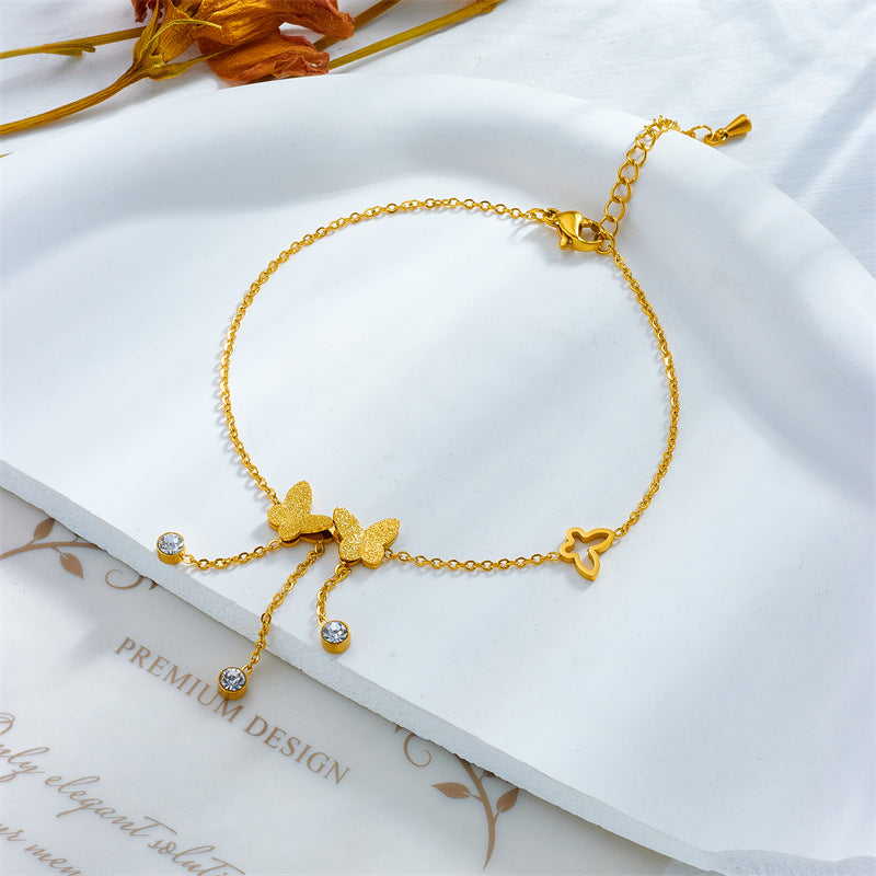 Minimalist Vintage Butterfly-Shaped Stainless Steel Anklet with Matte Finish, Hollow-Out Design and Rhinestone Accents