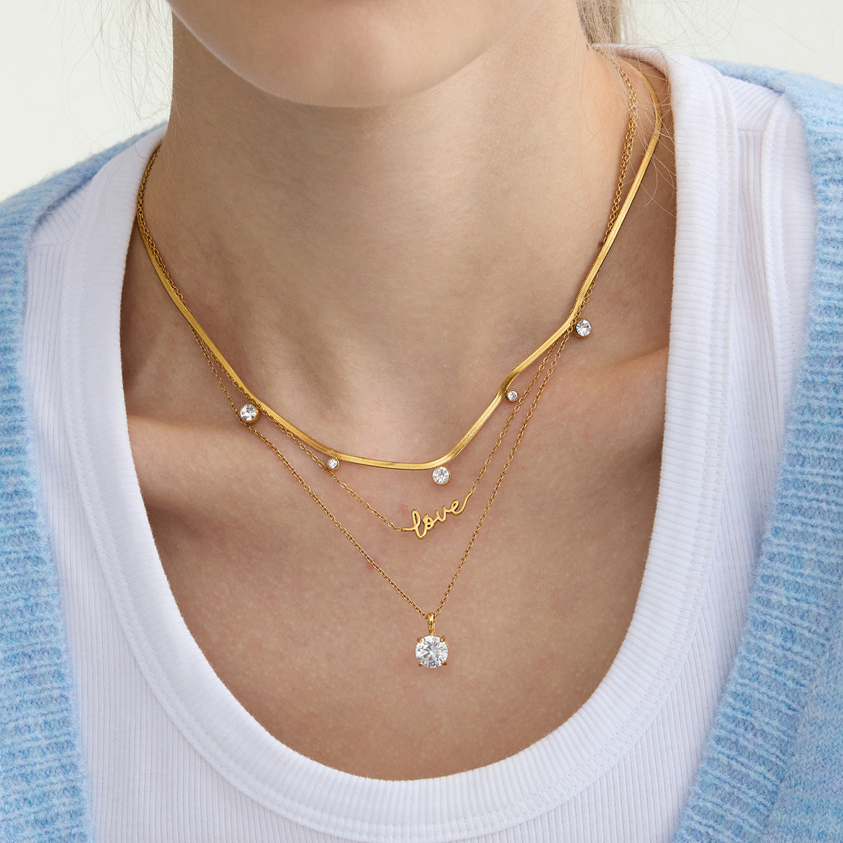Collana da donna in acciaio al titanio placcato oro 18 carati con zirconi geometrici di lusso