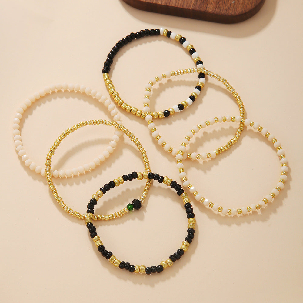 Bracciale elastico impilabile in stile bohémien per vacanze da donna con perline in vetro e design geometrico