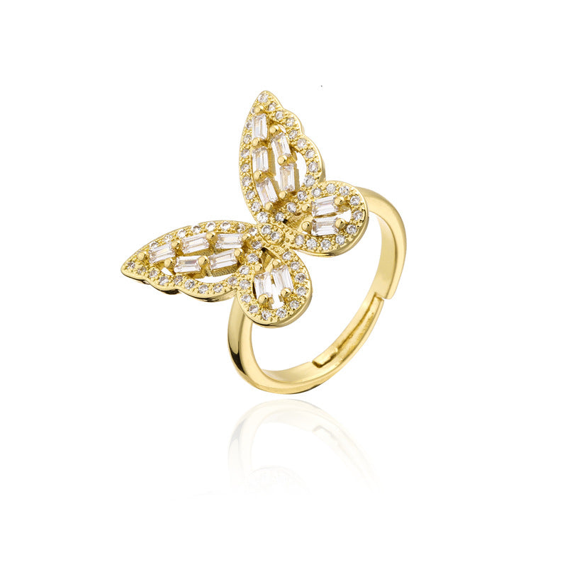 INS Style Geometric Butterfly Ring in Copper with Micro-Paved Cubic Zirconia and 18K Gold Plating