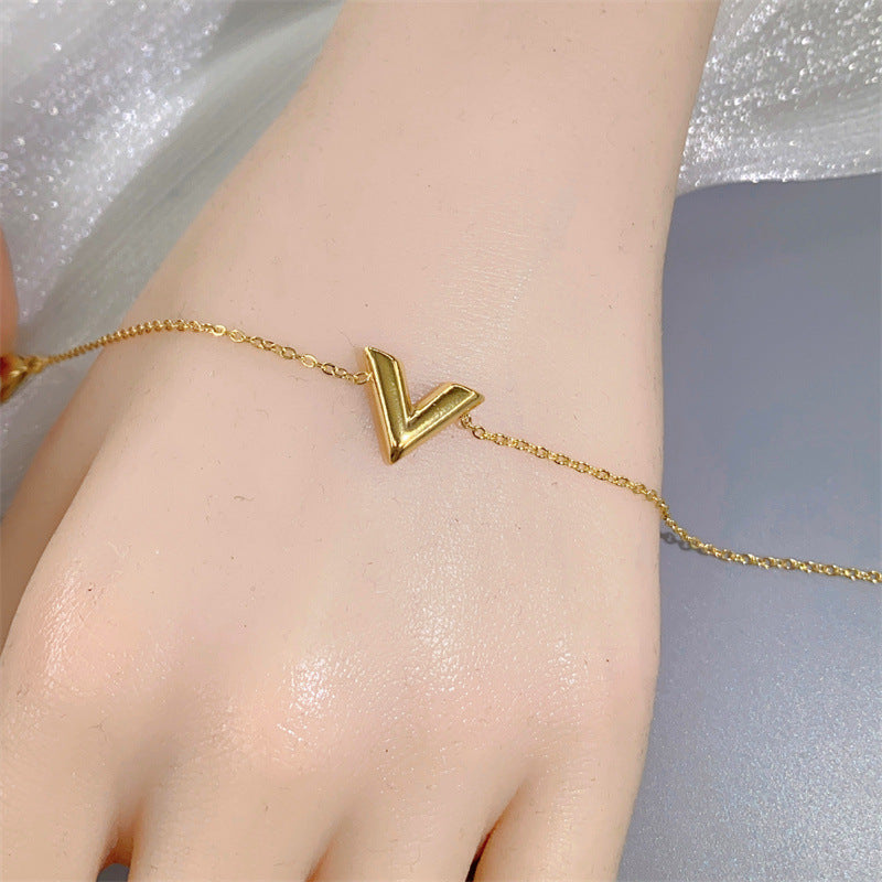 Minimalist Luxe V-Shaped Pendant Necklace for Women in Titanium Steel with Gold Plating Snake Chain
