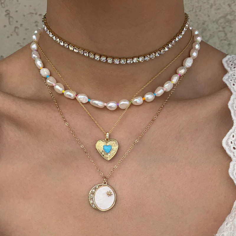 Collana Pendente Minimalista a Cuore in Acciaio al Titanio Placcato Oro per Donna e Uomo