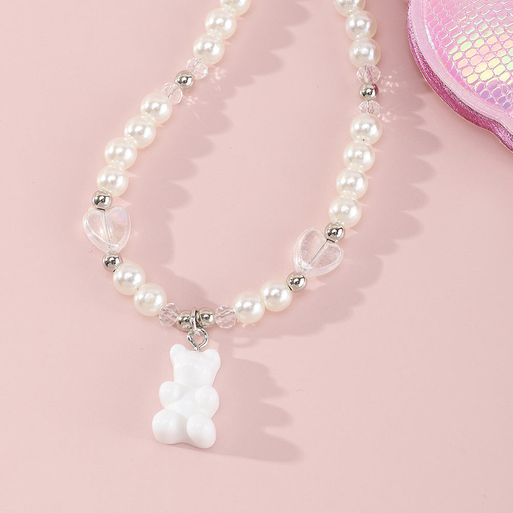Collana con ciondolo in resina a forma di orsetto e cuore per bambine con catena di perle a lunghezza regolabile