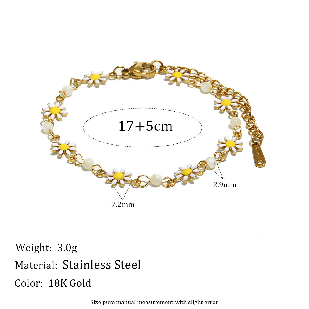 Pulsera minimalista de acero inoxidable con dije de margarita, detalles esmaltados y chapado en oro de 18 quilates para mujer
