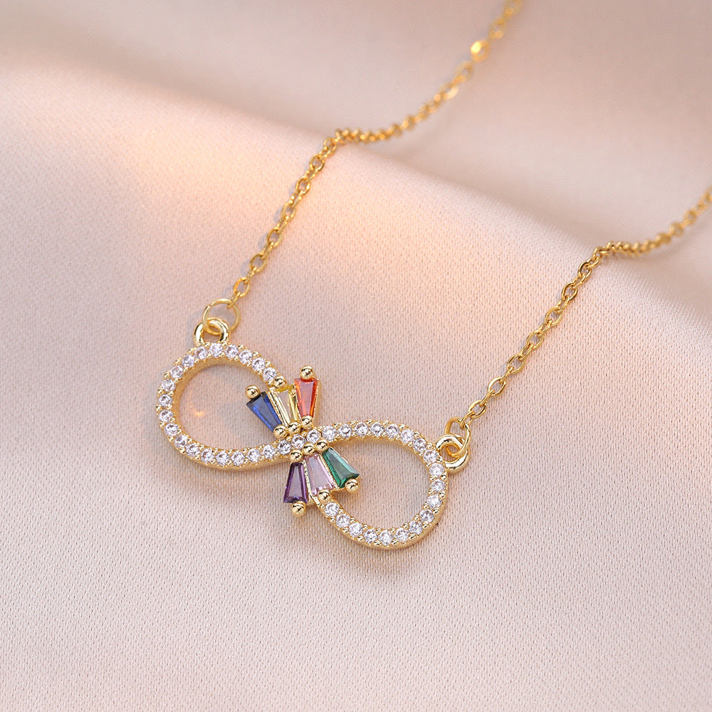 Collar con colgante minimalista de nudo de lazo de acero de titanio para mujer con cadena de serpiente chapada