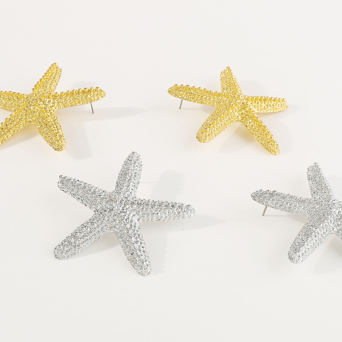 Pendientes de Aleación Minimalistas con Forma de Estrella con Acabado Chapado para Mujer, Aretes de Moda Geométricos Inspirados en el Océano