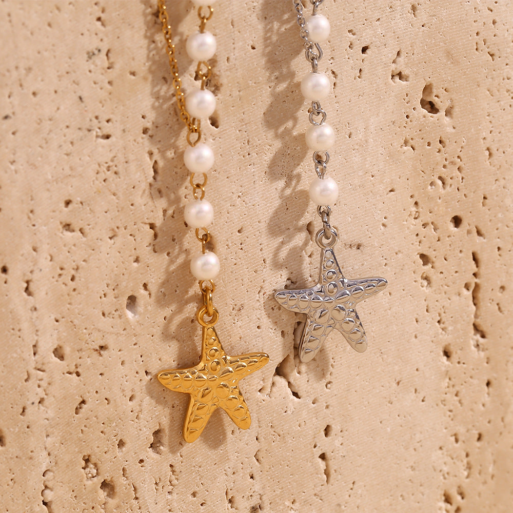 Collana con ciondolo a stella marina asimmetrica vintage da donna in acciaio inossidabile con placcatura in oro 18 carati e inserti in perle