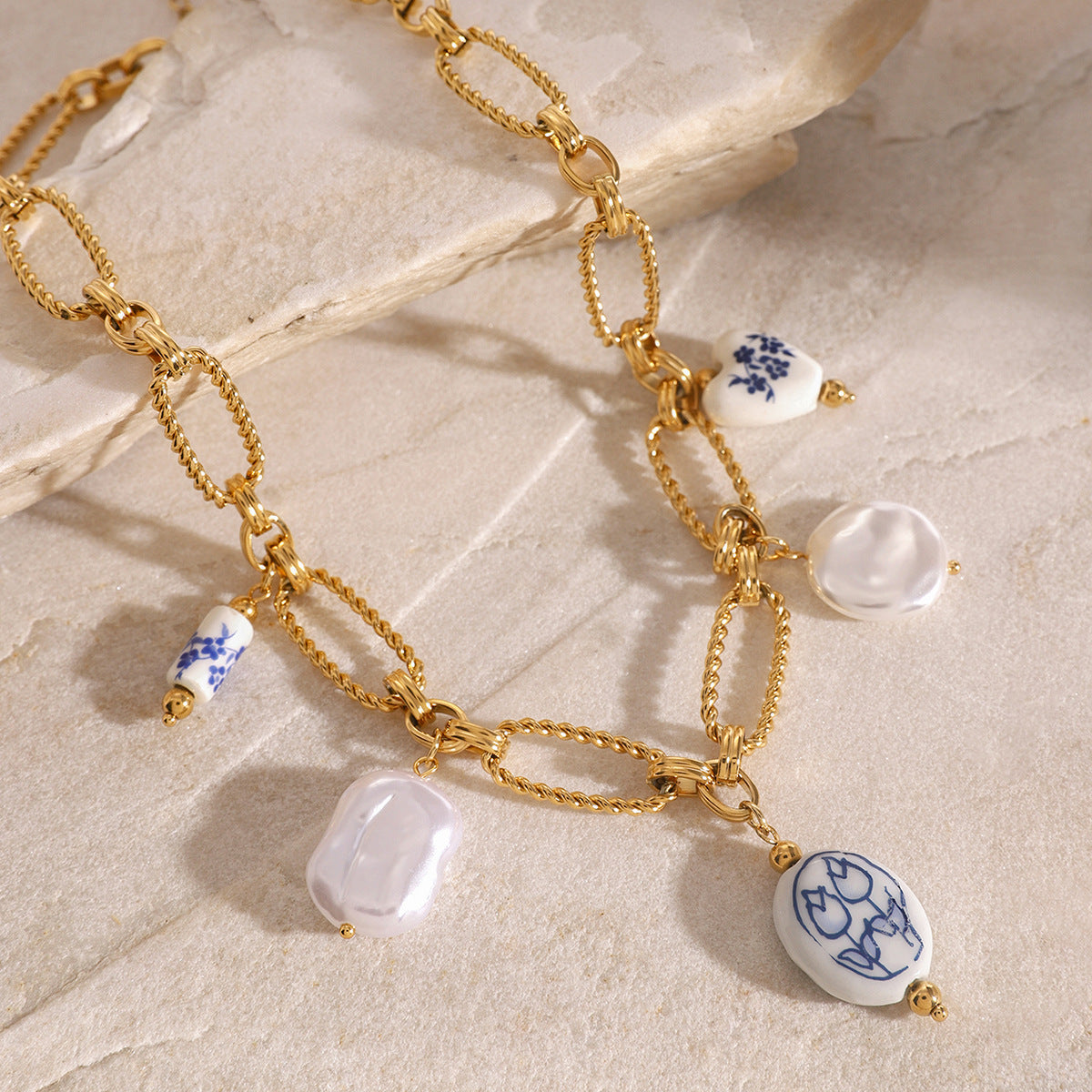 Collana con Pendente a Cuore Minimalista in Perla in Acciaio al Titanio con Finitura Galvanizzata da Donna