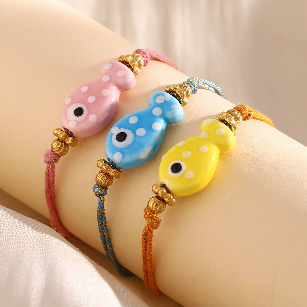 Bracciale da donna in corda intrecciata color oro, placcato in oro 18 carati, stile OL alla moda, a forma di pesce