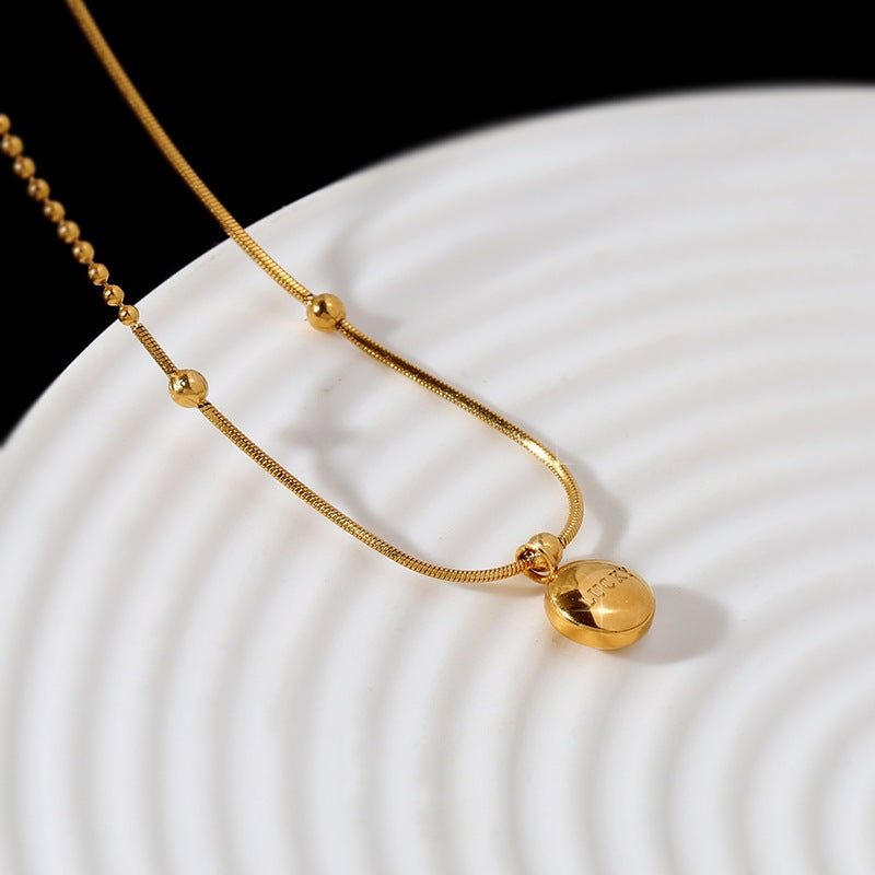 Minimalist Lucky Gold Bean Pendant Necklace in Titanium Steel with Gold Plating for Women and Men