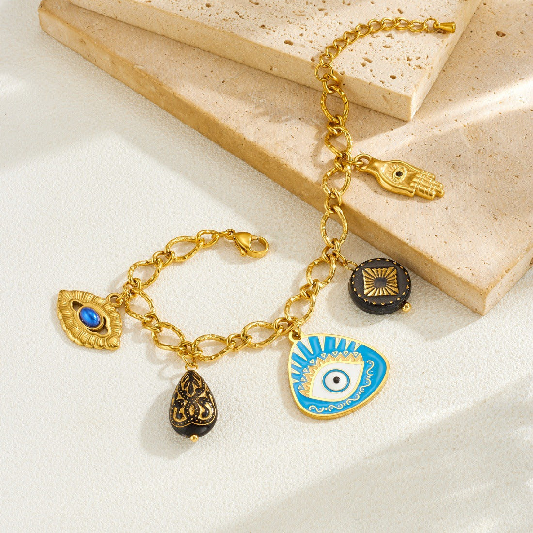 Fashion Geometric Drip Oil Plated Stainless Steel Bracelet with Irregular Blue Eye Palm Pendant for Women