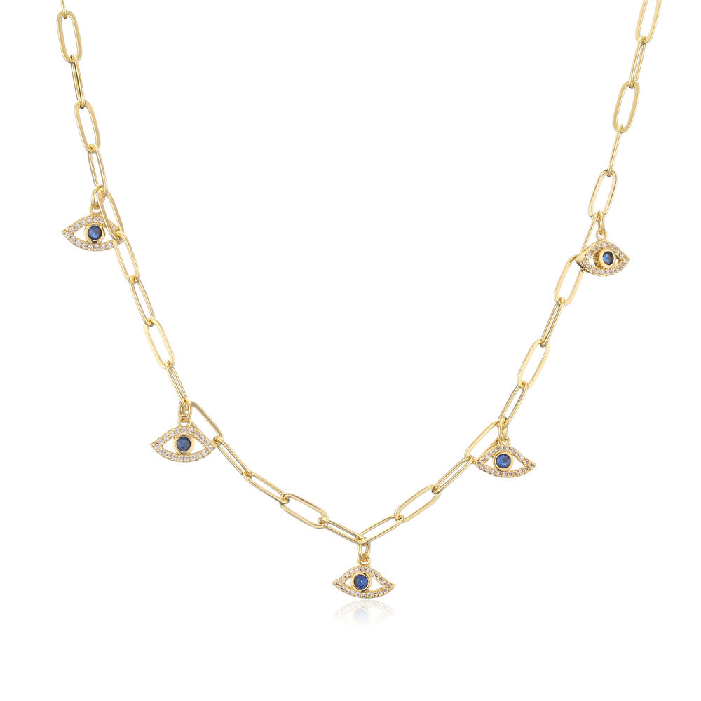Collana con ciondolo geometrico in rame con placcatura in vero oro e intarsio di zirconi