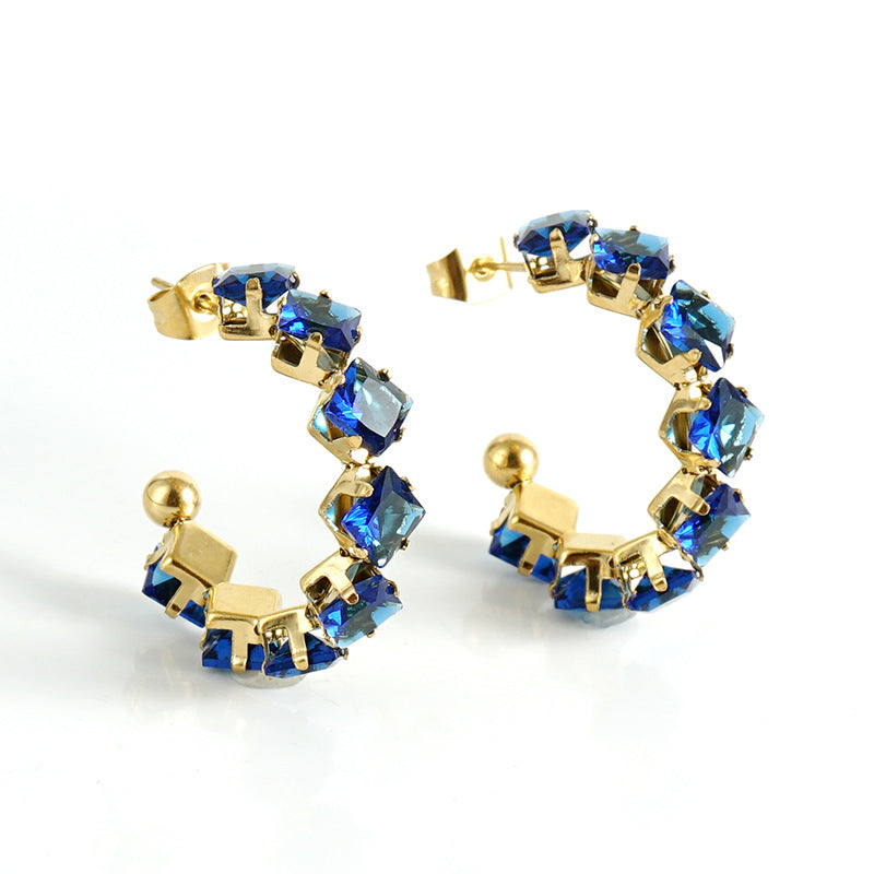 Orecchini a perno da donna alla moda geometrici in acciaio al titanio placcato oro 18K con zirconi
