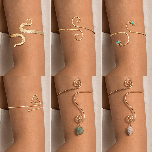 Pulsera abierta de cadena para el brazo, estilo hip hop, con diseño de espiral entrelazada de diamantes de imitación, borla y detalles circulares