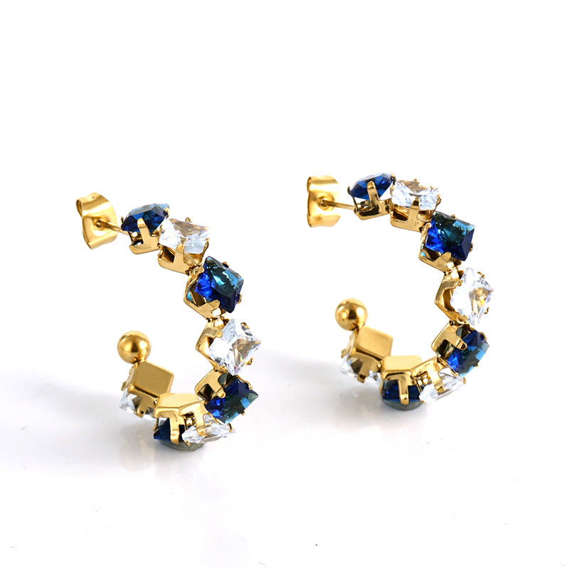 Orecchini a perno da donna alla moda geometrici in acciaio al titanio placcato oro 18K con zirconi