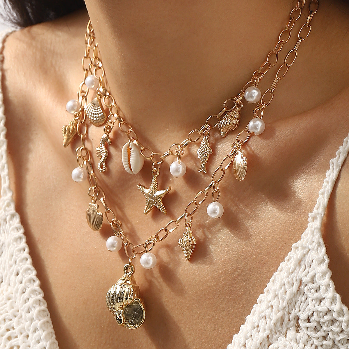 Collar con colgante geométrico estilo vacaciones con borlas de perlas y detalles de estrellas y conchas marinas en aleación con acabado chapado