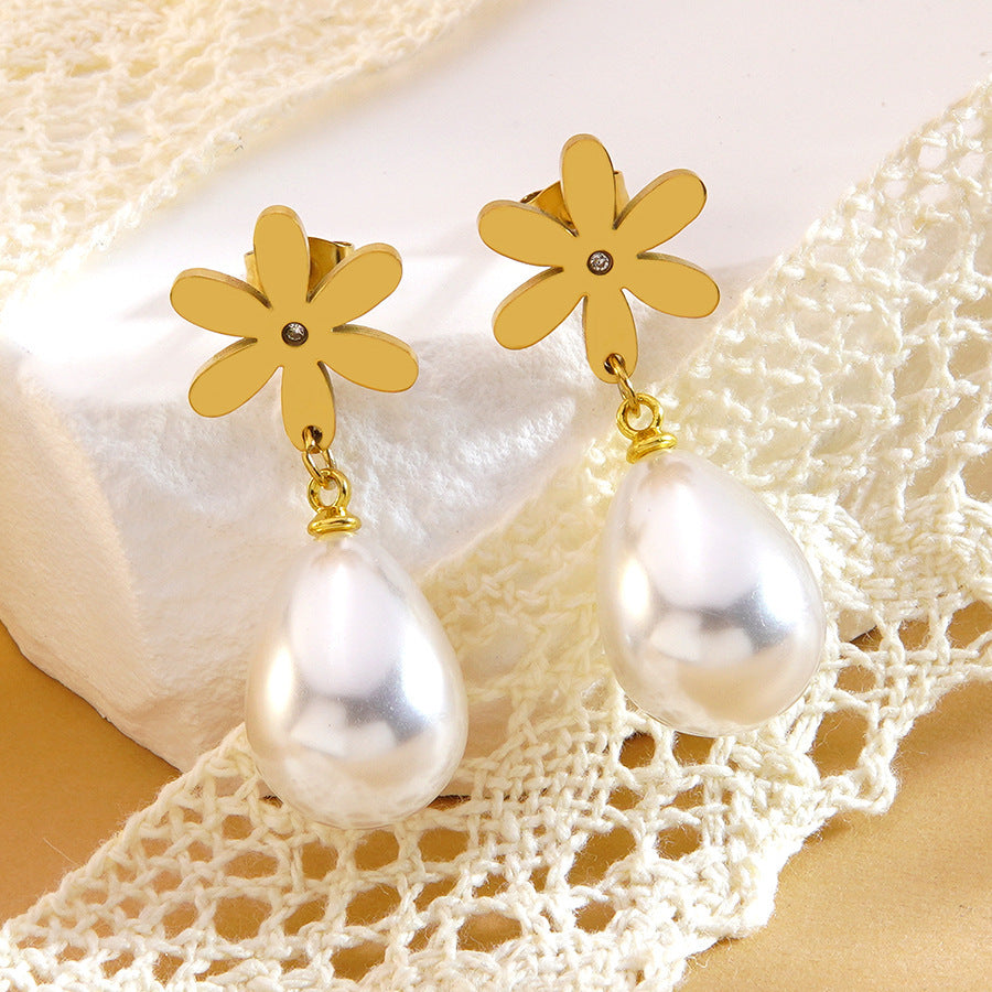 Orecchini placcati in acciaio inossidabile con fiore geometrico ed elegante fiocco, pendente con perla, stile vintage
