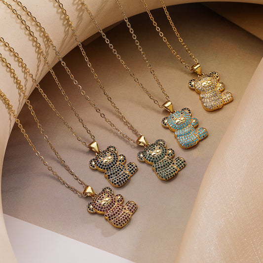 Collar con colgante de cobre con forma de oso minimalista con baño de oro y circonitas para mujer