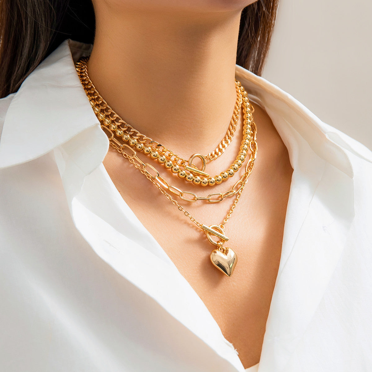 Collana da donna in lega a cuore geometrica dolce e audace con finitura placcata