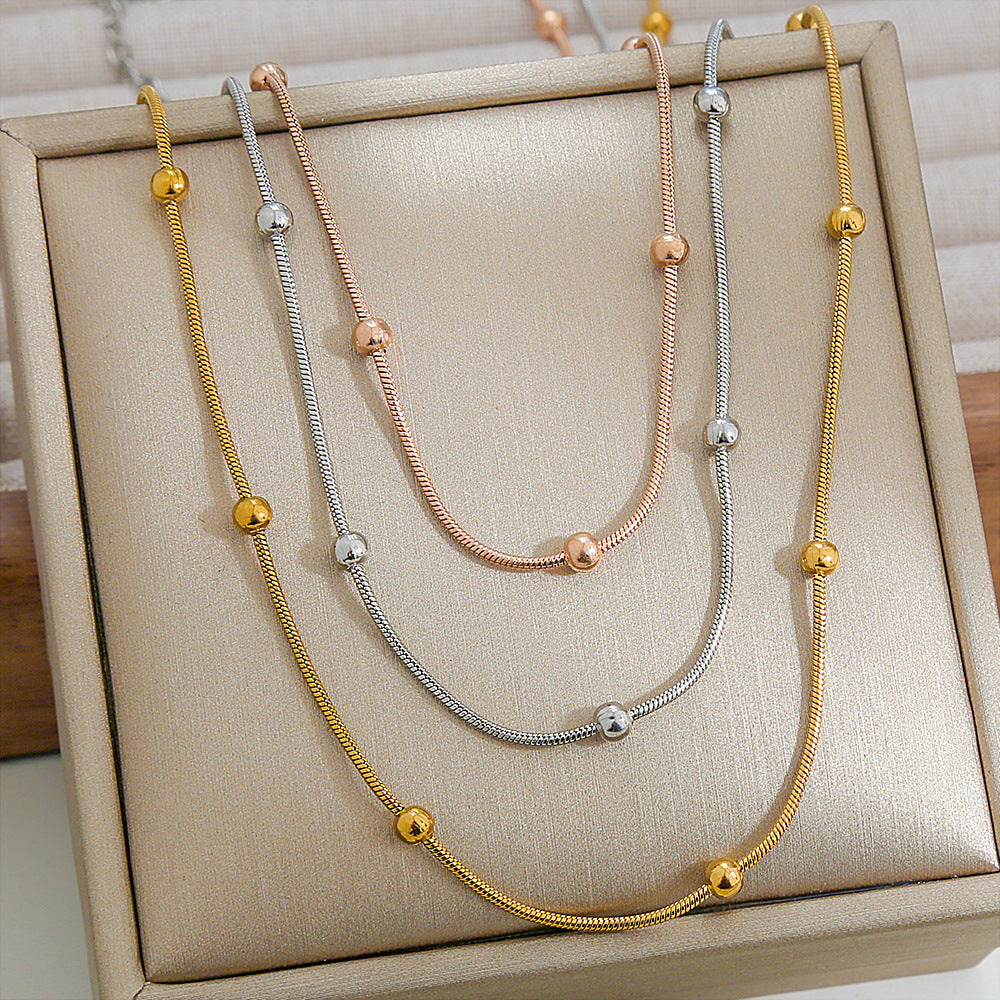 Collana con Perline Multistrato Stile Dolce e Grintoso con Catena in Acciaio Inossidabile e Ciondolo in Acciaio al Titanio a Forma di U da Donna