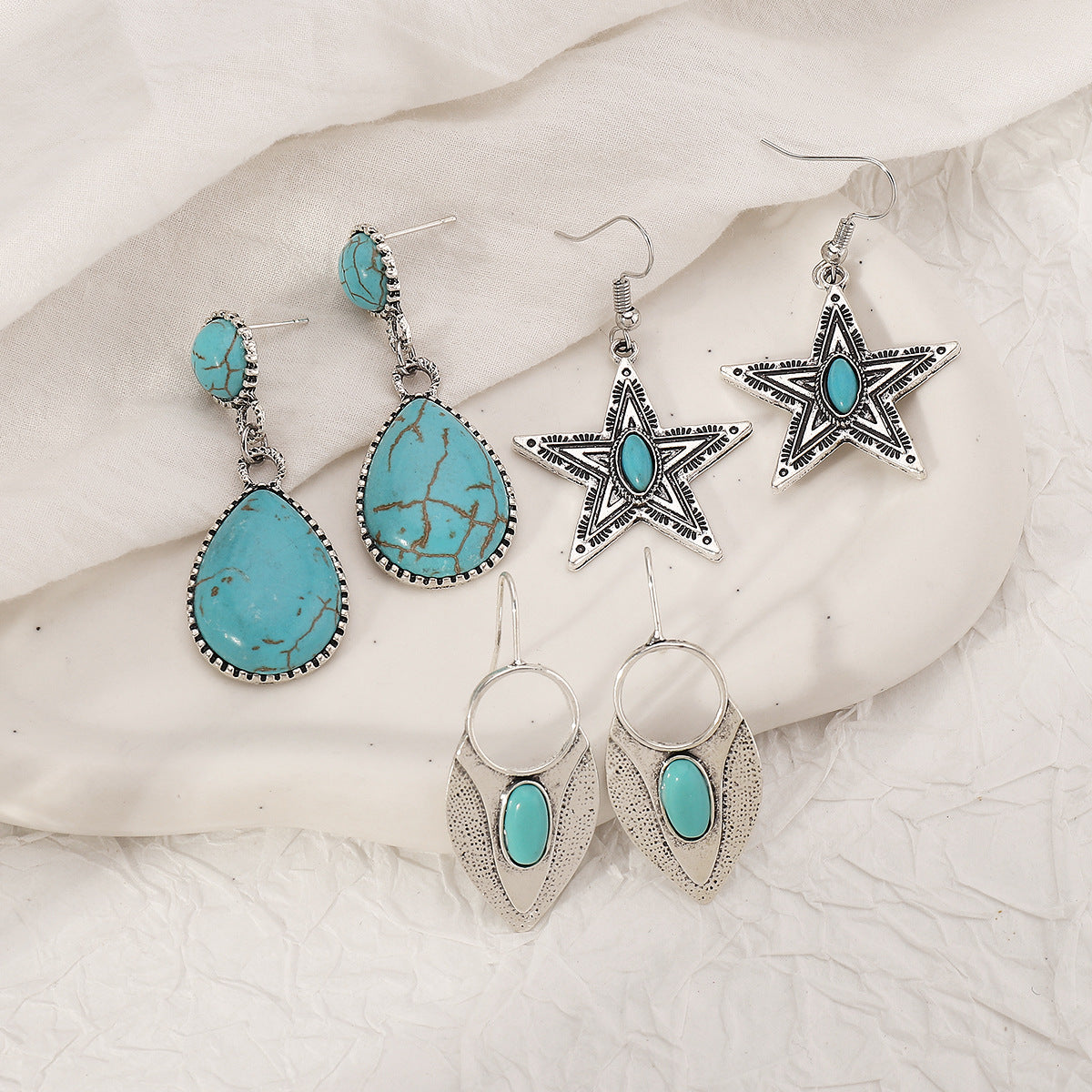 Pendientes étnicos de aleación con forma de estrella geométrica con incrustaciones de turquesa, diseño artístico vintage para mujer
