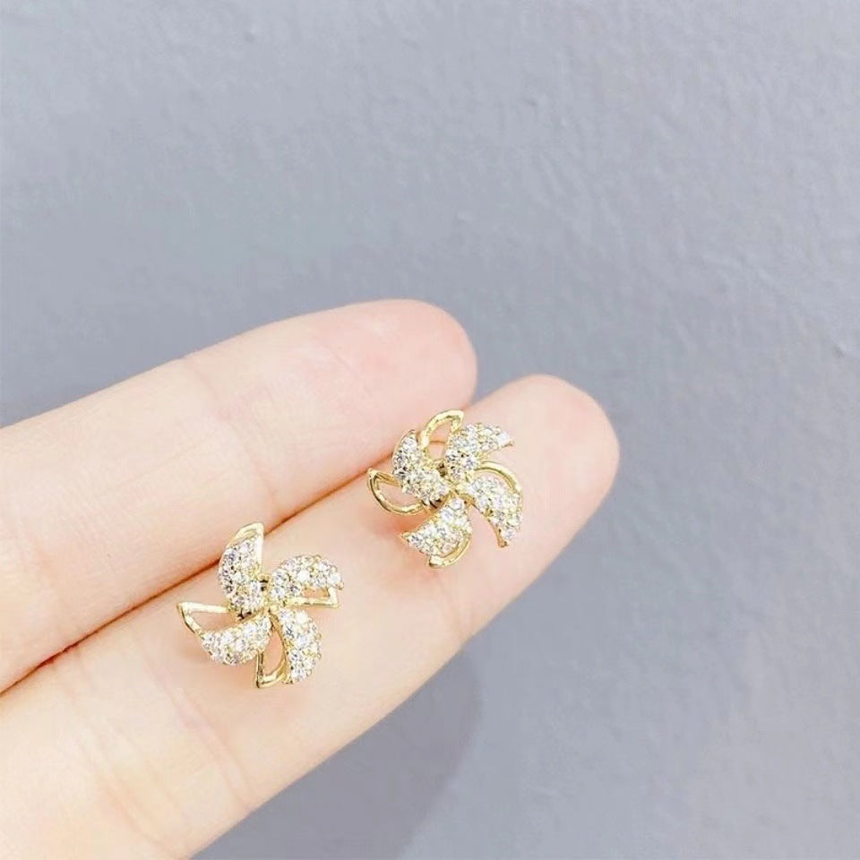 Rotatable Windmill Stud Earrings in Plated Copper with Geometric Octagonal Design for Women