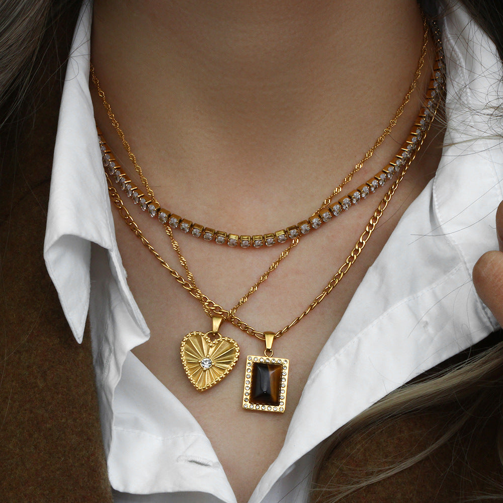 Fashionable Heart-Shaped Zircon-Set Stainless Steel Pendant Necklace with 18K Gold Plating and Leaf Texture for Women