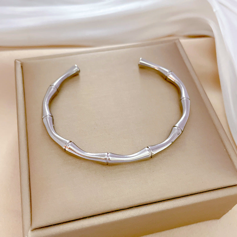 Minimalist Bamboo Joint Titanium Steel Bracelet with Chinese Traditional Auspicious Motifs and Plated Finish