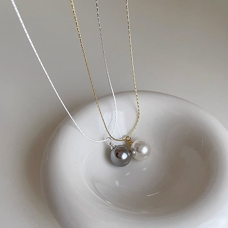 Collana girocollo minimalista con pendente di perla per donna, catena a serpente in acciaio al titanio con forma animale irregolare e finitura galvanizzata
