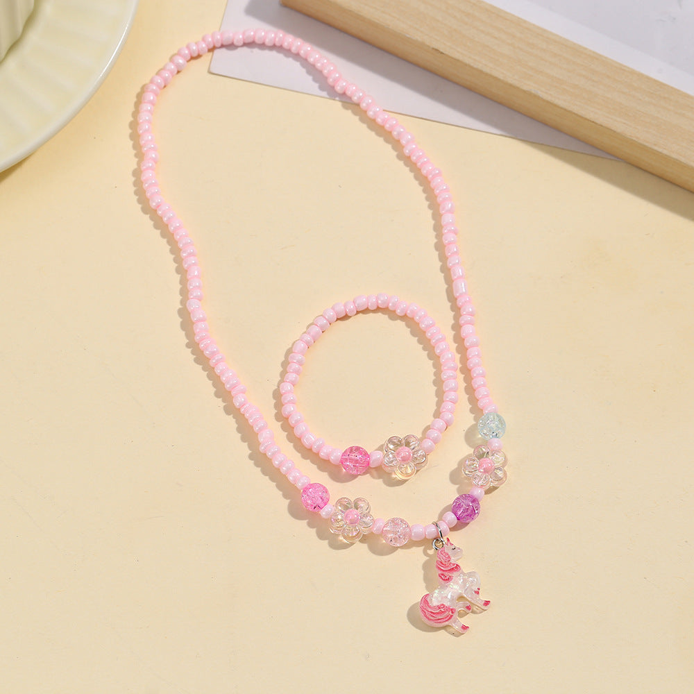 Lindo conjunto de collar de resina de sirena y unicornio para niños con detalles de arcoíris y cadena de cuentas redondas