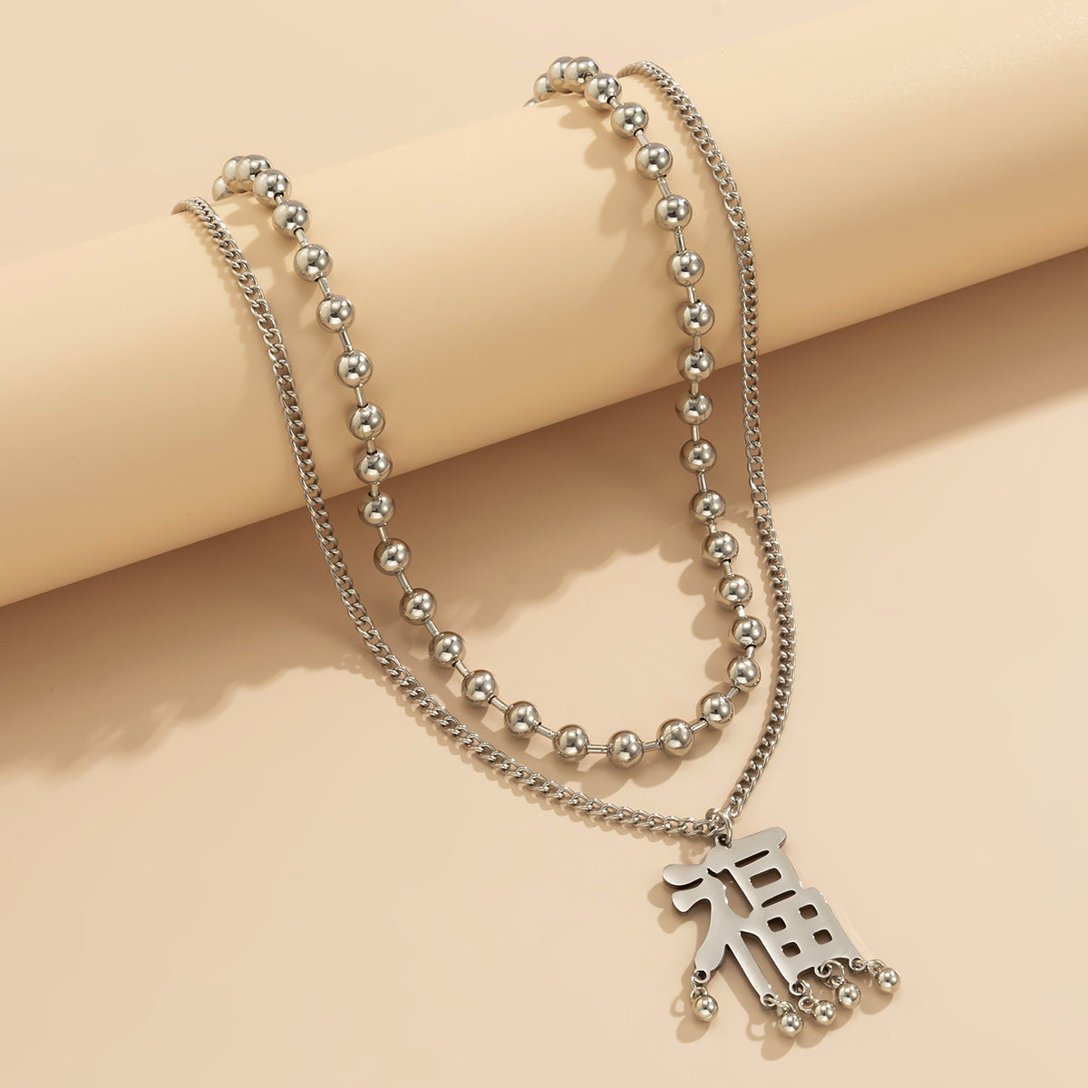 Vintage Geometric Pendant Necklace for Women with Tassel Detail, Metal Chain and Hollow-Out Design