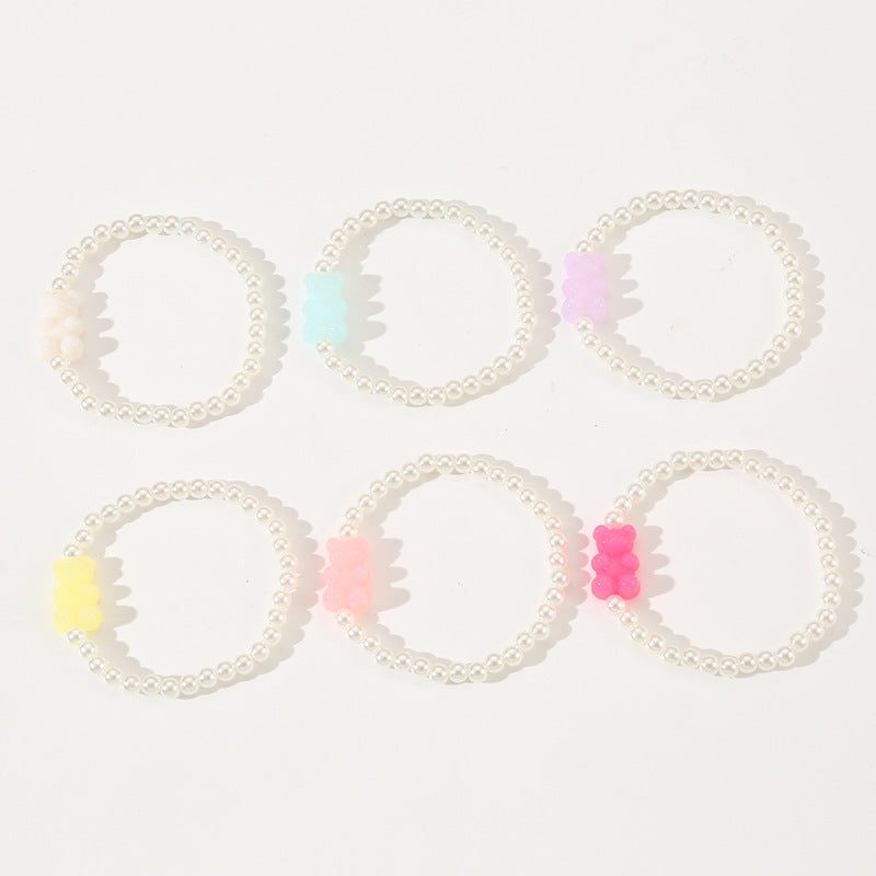 Braccialetto per bambini con ciondolo a orsetto in resina minimalista, design con perline fatte a mano e estetica fresca