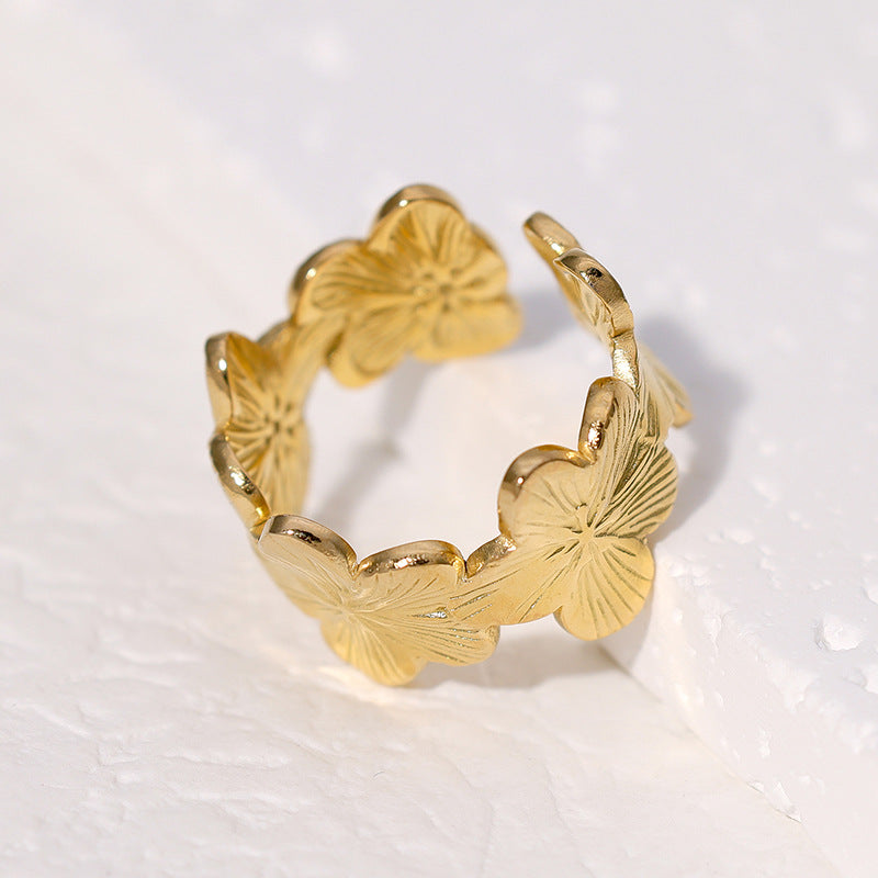 Anillo floral rústico para mujer de acero inoxidable con acabado chapado y banda ajustable