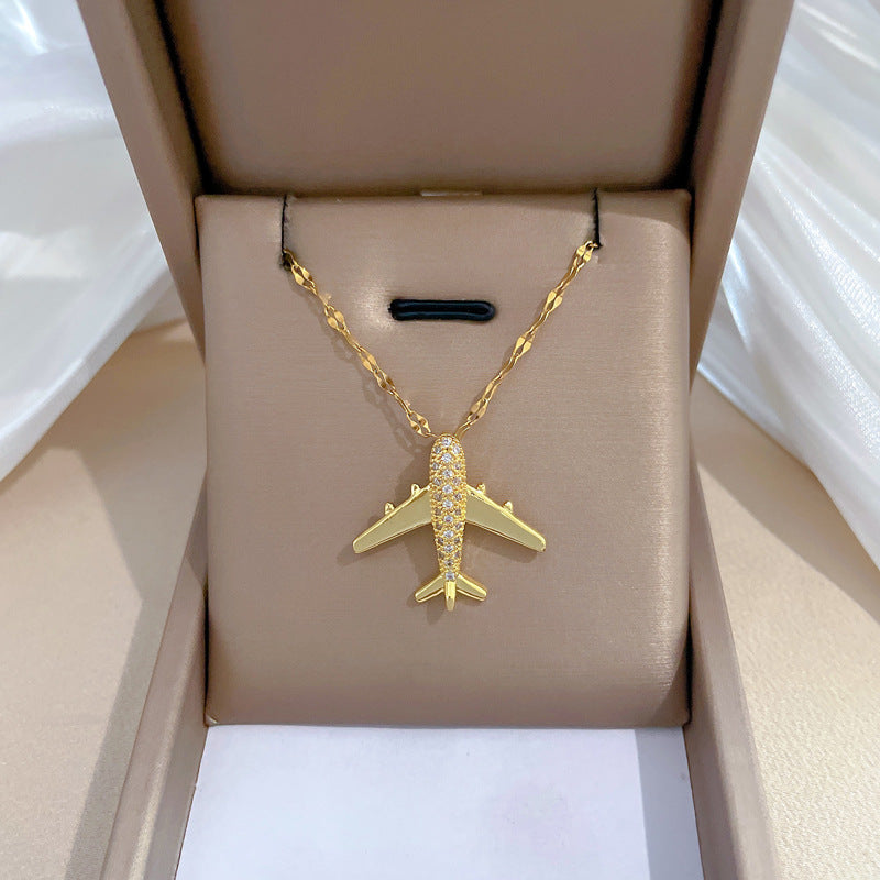 Collar con colgante de avión de lujo con diamantes de imitación, cadena de clavícula geométrica de acero de titanio