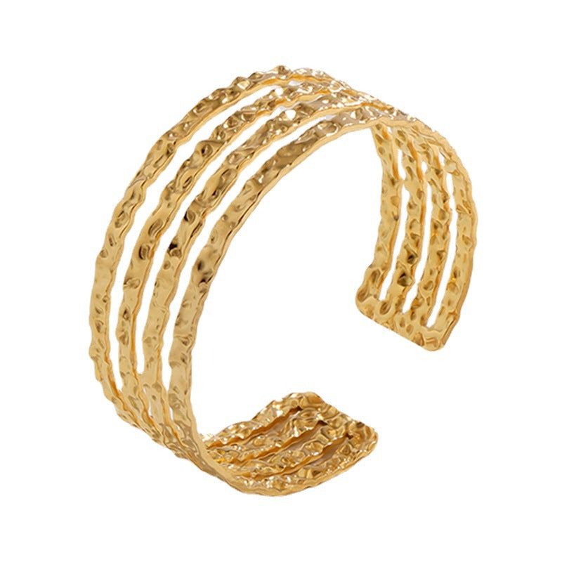 Pulsera de acero de titanio texturizada irregular con acabado galvanizado para mujer, brazalete de acero inoxidable moderno y versátil