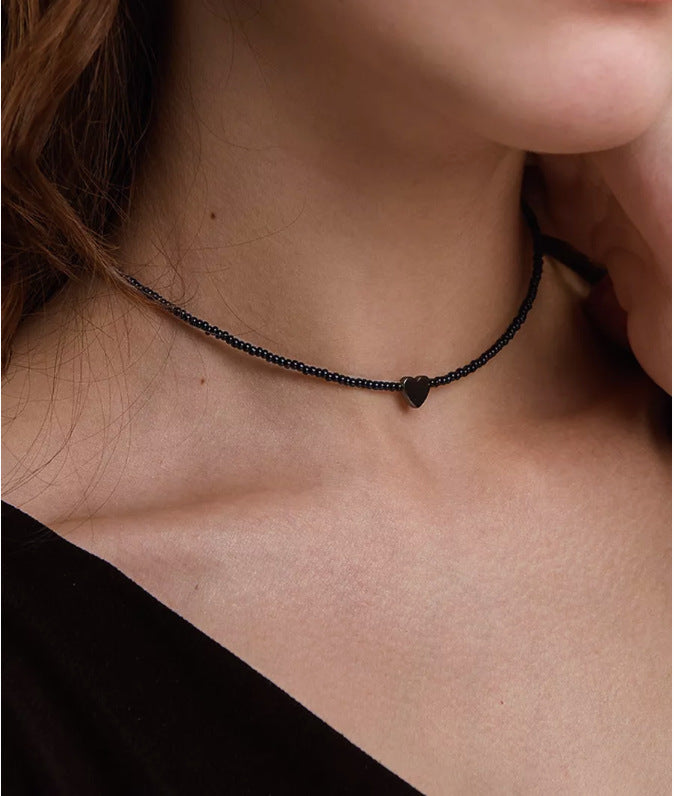 Minimalist Heart-Shaped Alloy Pendant Necklace with Crystal Glass Beads and Black Onyx Accents on Delicate Clavicle Chain