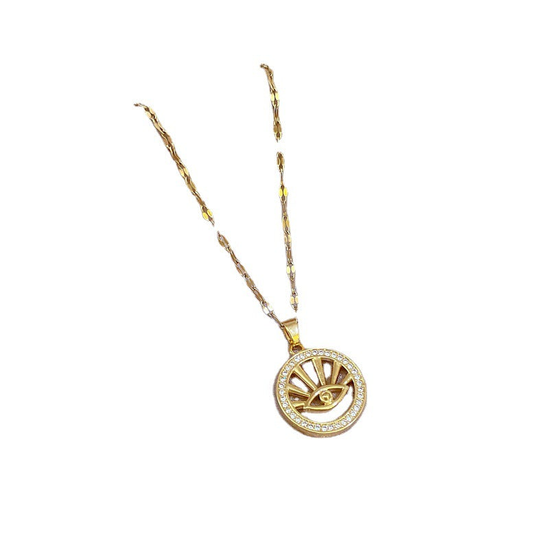 Collana Minimalista Geometrica in Acciaio al Titanio con Ciondolo Occhio di Allah in Zirconia Micro-Incastonata e Dettaglio in Rame Placcato Oro