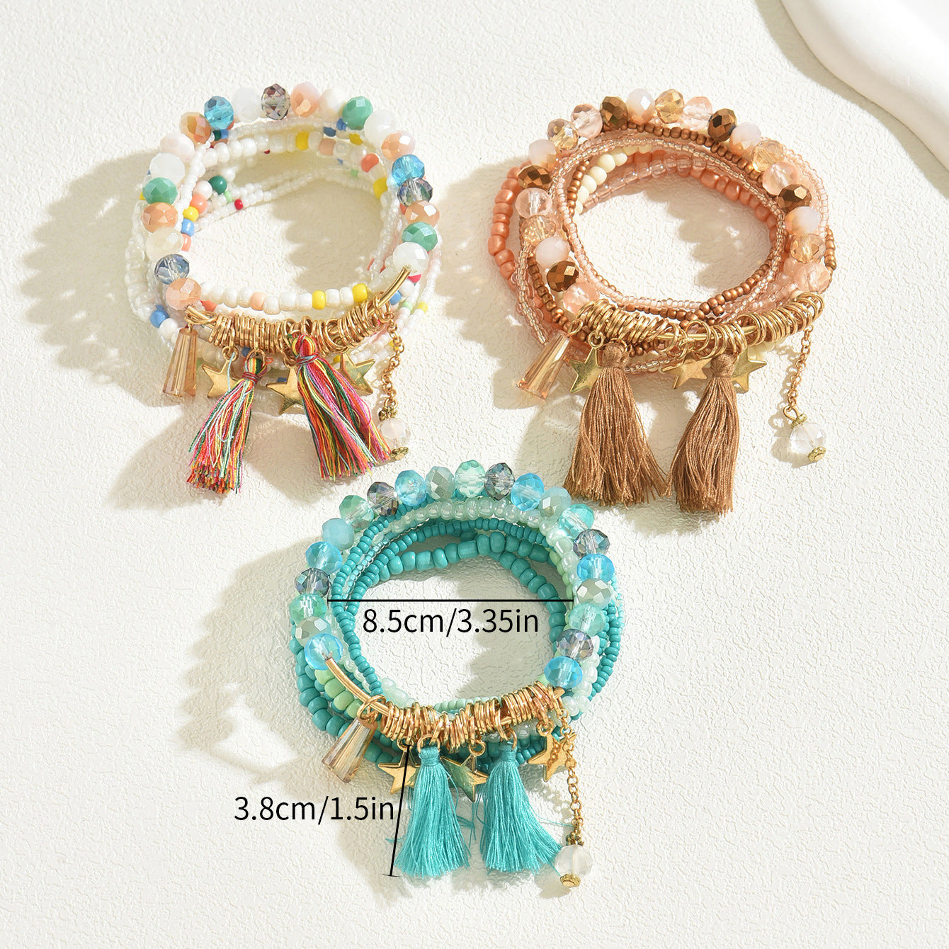 Bracciale donna multistrato bohémien con perline geometriche, nappa e ciondolo a stella