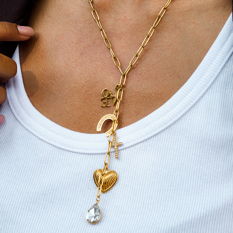 Collana a Y minimalista in acciaio al titanio a forma di cuore con finitura smaltata e catena in acciaio inossidabile da donna