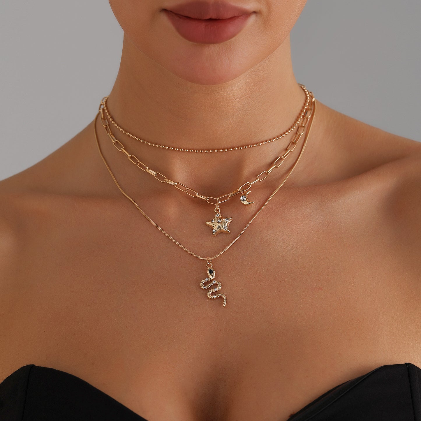 Vintage-Style Star and Moon Pendant Necklace with Rhinestone Inlay in Alloy, Snake Chain Design for Women