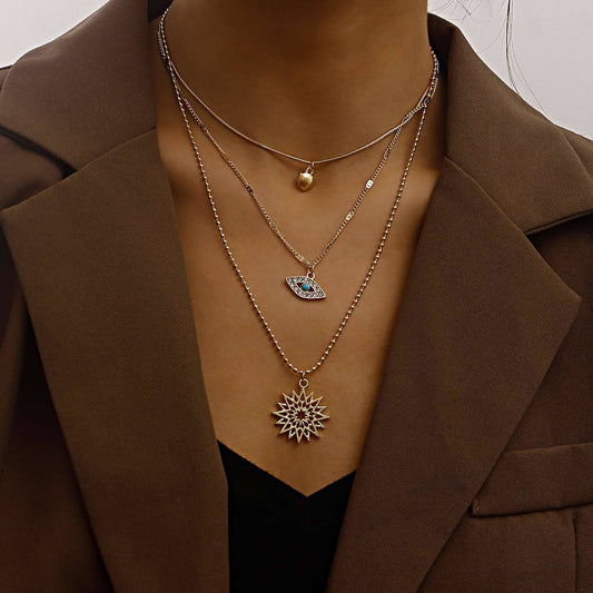 Vintage Minimalist Multi-Layer Beaded Snake Chain Necklace with Rhinestone-Embellished Evil Eye and Heart Pendant for Women