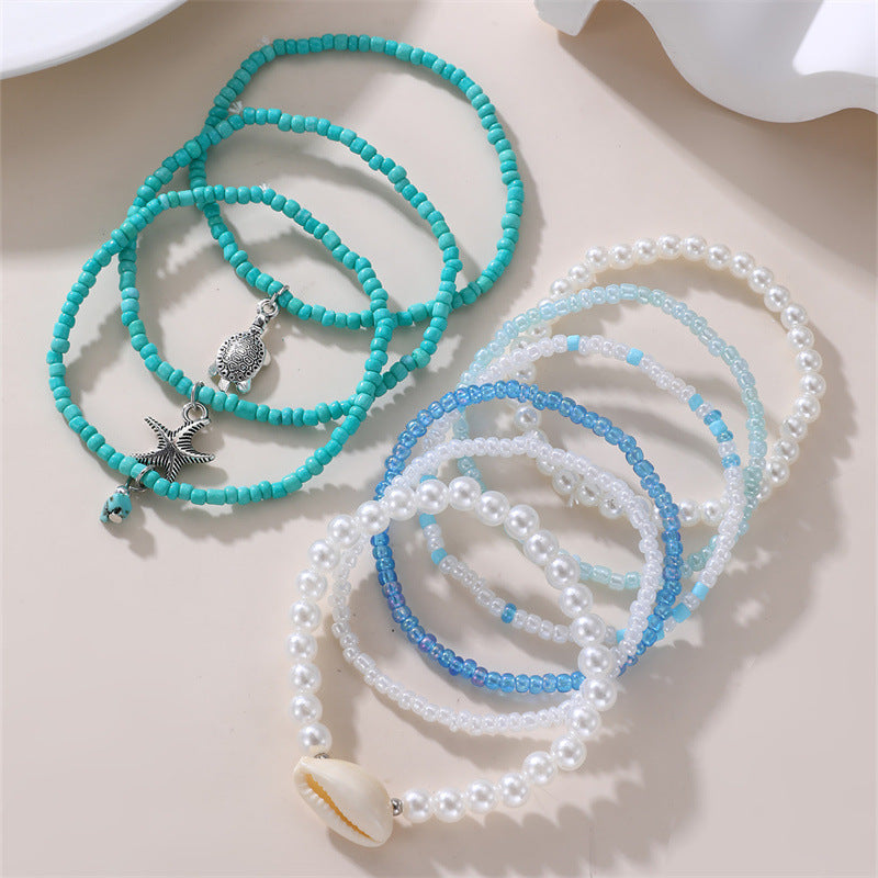 Pulsera de cristal con forma de estrella de mar, minimalista, para niñas, con acabado artesanal y diseño inspirado en el océano.