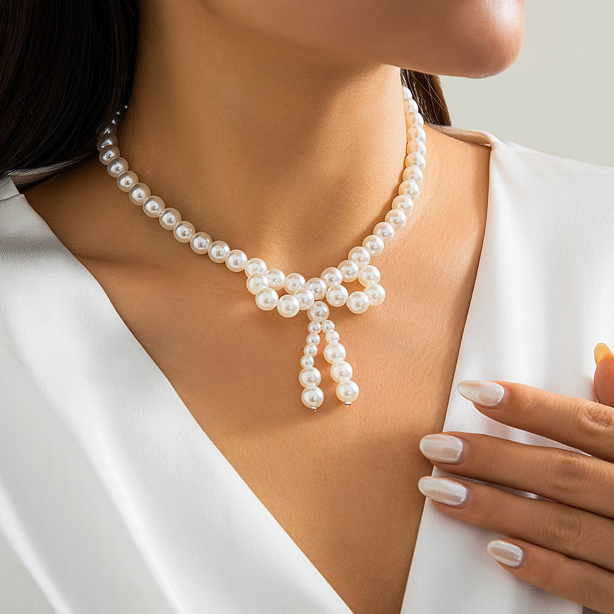 Minimalist Bow-Shaped Choker Necklace with Resin Beads and Round Ball Chain for Women