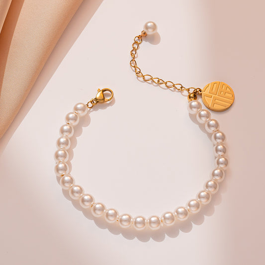 Bracciale di lusso geometrico con perle e titanio placcato oro 18K da donna