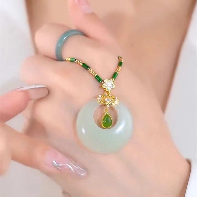Collana a Forma di Goccia d'Acqua dal Design Originale in Acciaio al Titanio con Ciondolo in Rame Placcato Oro e Catena a O per Donne e Uomini