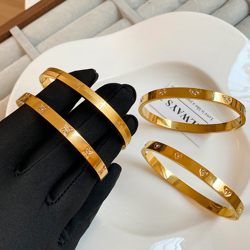 Micro-Inlaid Cubic Zirconia Oval Geometric Titanium Steel Plated Bracelet for Women