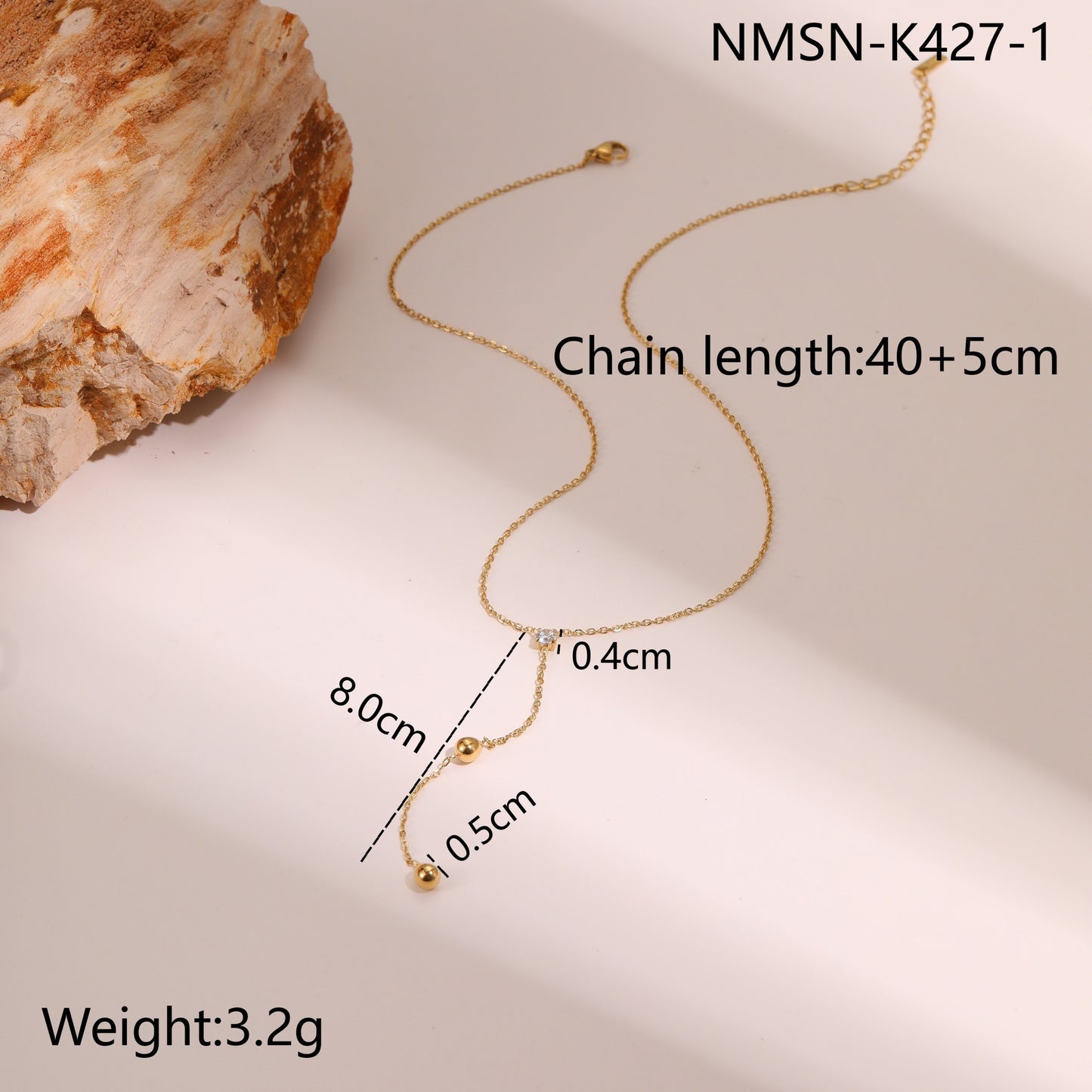 Collana a Y minimalista da donna in acciaio inossidabile con zircone, finitura placcata oro e dettaglio a nappina
